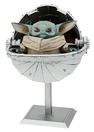 ICONX: The Child DIY kit by Metal Earth, featuring a detailed model of a small green character with large ears, seated in a futuristic pod. The model is made of metal and includes intricate design elements, making it a perfect collectible for fans.