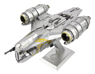 The ICONX Razor Crest is a detailed metallic DIY kit by Metal Earth, showcasing a stylized spaceship model with intricate designs and a sturdy base. The model features realistic metallic detailing, two prominent engines, and a sleek body, perfect for collectors and hobbyists. Ideal for crafting enthusiasts looking to build and display a standout piece.