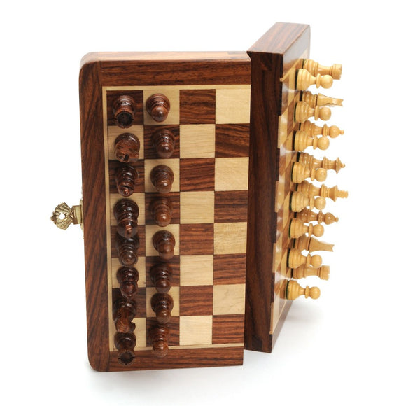 A 12-inch wooden chess set featuring a magnetic folding design. The chessboard has alternating light and dark squares, with intricately detailed wooden pieces, showcasing kings, queens, bishops, knights, rooks, and pawns. The set is stored in a compact case that closes securely, ideal for travel and storage.