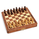 A 12-inch wooden chess set featuring a magnetic folding design. The chessboard displays alternating light and dark squares with wooden pieces in two colors, arranged for play. The set is compact and easily foldable for storage and travel, showcasing a rich wood finish.