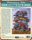 The Fabulous 50s Junkpile jigsaw puzzle features a colorful illustration of a towering junkpile consisting of classic American cars from the 1950s. The artwork celebrates the golden age of the American automobile industry, showcasing various models stacked high against a simple natural background. The puzzle is designed to engage users in a nostalgic experience of car culture in the post-World War II era.
