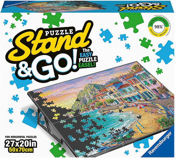Puzzle Stand & Go! by Ravensburger is an innovative jigsaw puzzle easel designed to hold and display your puzzle, measuring 27x20 inches. The product features a vibrant image of a coastal scene, symbolizing both fun and relaxation. It is perfect for assembling horizontal puzzles, making it easier for puzzle enthusiasts to work on their projects while maintaining an organized workspace.