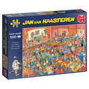 Magic Fair jigsaw puzzle by Jan Van Haasteren features a vibrant comic-style illustration filled with whimsical characters engaging in various activities at a bustling fair. The puzzle consists of 1000 pieces, showcasing a lively scene with detailed artwork.