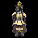 A detailed DIY kit of a Metal Earth Samurai Armor model from Fascinations. The model showcases intricate metal pieces forming a traditional samurai armor with vibrant colors and fine craftsmanship. Ideal for model enthusiasts and hobbyists looking for a unique project.