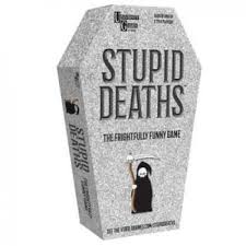 Stupid Deaths Tin by University Games, designed as a humorous game inside a coffin-shaped box. The box features playful graphics and text, highlighting the comedic theme of bizarre deaths. Perfect for game nights and parties.