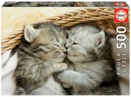 Educa Sweet Kittens jigsaw puzzle featuring two adorable, sleeping kittens nestled together in a cozy basket. The puzzle consists of 500 pieces, ideal for cat lovers and puzzle enthusiasts alike.