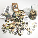 An array of intricately shaped wooden jigsaw puzzle pieces from the '20th Century Transport' puzzle by Trove, displayed alongside a jar of additional pieces and a booklet detailing the puzzle. The vibrant colors and designs reflect transportation themes of the 20th century, inviting puzzle enthusiasts to piece together a nostalgic scene.
