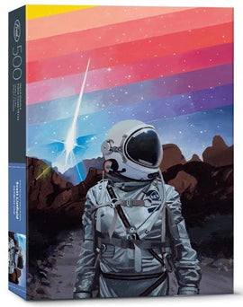 Rainbow One jigsaw puzzle featuring a vibrant illustration of an astronaut standing on a rocky landscape with colorful stripes and stars in the sky. The puzzle contains 500 pieces, making it a challenging and engaging activity for puzzle enthusiasts and space lovers.