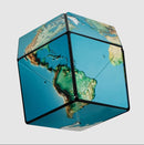 Shashibo Earth by Geobenders is a mechanical puzzle shaped like a cube, featuring a beautifully detailed map of the Earth with vibrant colors representing continents and oceans. This unique puzzle offers an engaging and tactile experience, encouraging problem-solving and creativity as users manipulate its geometric design.
