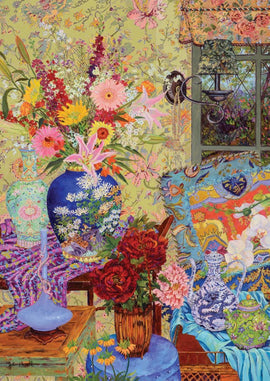 A vibrant jigsaw puzzle titled 'Window Nook' by Art & Fable Puzzle Co. Features a colorful arrangement of flowers in various vases, with a detailed floral wallpaper and a cozy chair, capturing a serene indoor scene.