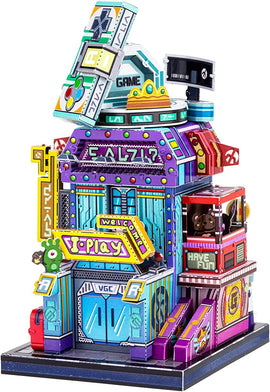 A colorful 3D model of a game shop, featuring vibrant signs like 'I-Play' and 'Have Fun'. The design includes elements such as a gaming console and playful character figurines, showcasing an inviting and fun atmosphere perfect for a DIY project.