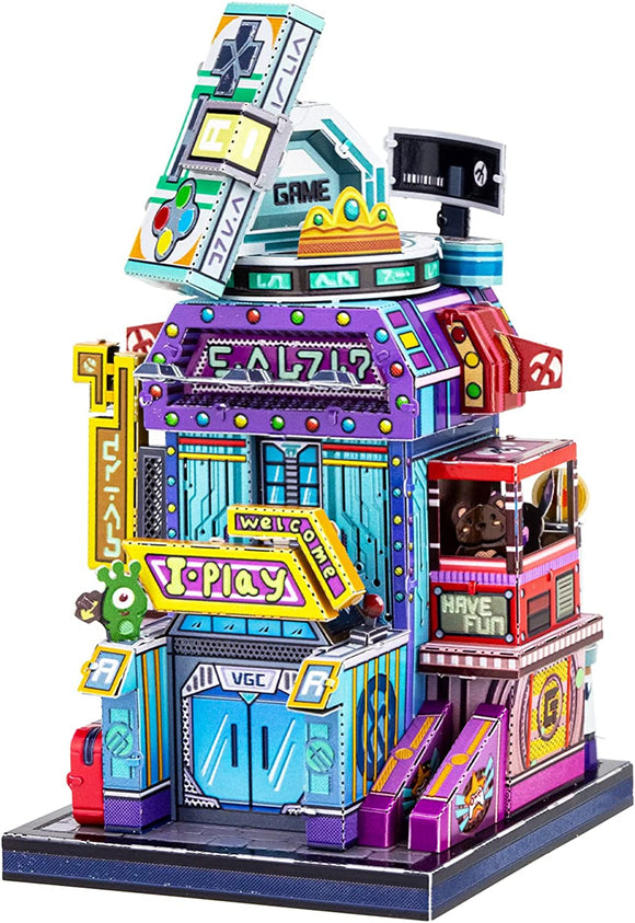 A colorful 3D model of a game shop, featuring vibrant signs like 'I-Play' and 'Have Fun'. The design includes elements such as a gaming console and playful character figurines, showcasing an inviting and fun atmosphere perfect for a DIY project.