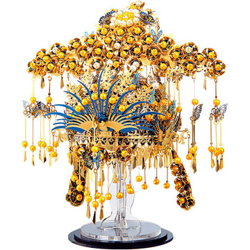 The Phoenix Coronet by Piececool is a stunning DIY kit featuring intricate gold and blue details. This beautiful piece showcases a crown adorned with yellow beads and butterflies, supported by a clear display stand. Perfect for craft enthusiasts, it combines art and engineering for a satisfying build experience.