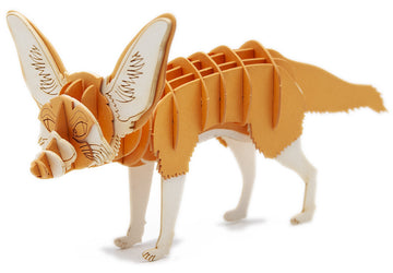 A 3D paper model of a desert fox, intricately designed with layered orange and cream paper. The fox stands on four legs, showcasing detailed facial features and large ears. This DIY kit offers a creative crafting experience for enthusiasts.