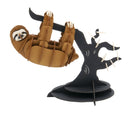 A 3D paper model of a sloth hanging from a branch. The sloth has a friendly expression, textured with different shades of brown, and is suspended from a stylized tree with curved branches and a black base. The design showcases intricate details, making it a perfect addition to any DIY craft collection.