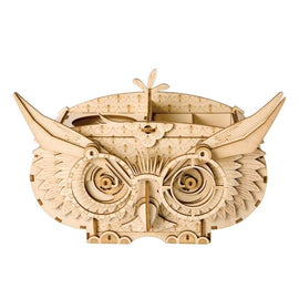 A beautifully designed 3D wooden Owl Storage Box kit by Robotime. The kit features intricate details, including layered wings, whimsical eyes, and a decorative top. Perfect for DIY enthusiasts and owl lovers, this storage box doubles as a decorative piece once assembled.