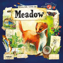 The game 'Meadow' by Rebel features an artistic design showing a vibrant illustration of a cute animal with orange fur and large eyes, surrounded by botanical elements like green leaves and scattered nature-themed images including butterflies and flowers. The title 'Meadow' is prominently displayed at the top, conveying a connection to wildlife exploration and nature.