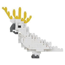 A detailed representation of a Sulfur-Crested Cockatoo made from Nanoblock building blocks. The model features a white body, grey accents, and striking yellow crest feathers, showcasing a playful design suitable for DIY enthusiasts.