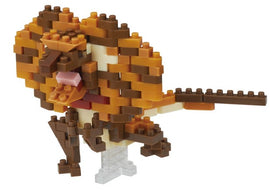 A detailed Nanoblock DIY kit featuring a vibrant frilled lizard constructed from small interlocking plastic blocks. The lizard showcases an intricate design with various shades of brown, orange, and cream. It stands on a transparent base, highlighting its unique features and dynamic shape, making it an eye-catching addition to any collection.
