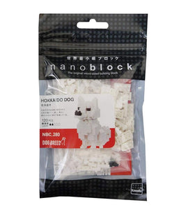 Nanoblock Hokkaido Dog DIY kit featuring 120 micro-sized building blocks. The package displays an assembled dog figure in white, showcasing its intricate design and attention to detail. Ideal for builders and dog lovers alike, this set invites creativity and fine motor skills development.