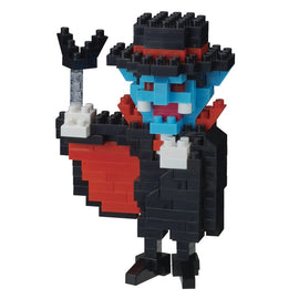 A colorful Nanoblock kit depicting a vampire character. The figure features a blue face, white fangs, and is dressed in a classic black suit with a red cape. One hand is raised, holding a small object, showcasing the intricate arrangement of blocks that make up its design, ideal for creative building.
