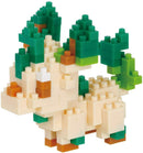 A colorful Nanoblock DIY kit featuring a detailed model of Leafeon, a popular Pokémon character. The model showcases various shades of green and tan blocks, representing Leafeon's leafy ears and body with intricate detailing. Perfect for creative building and display.