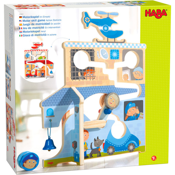A colorful Motor Skills Game by HABA featuring a vibrant design with engaging action stations. The game includes elements like a helicopter, a blue car, and characters that enhance fine motor skills. Ideal for young children to develop coordination through play.