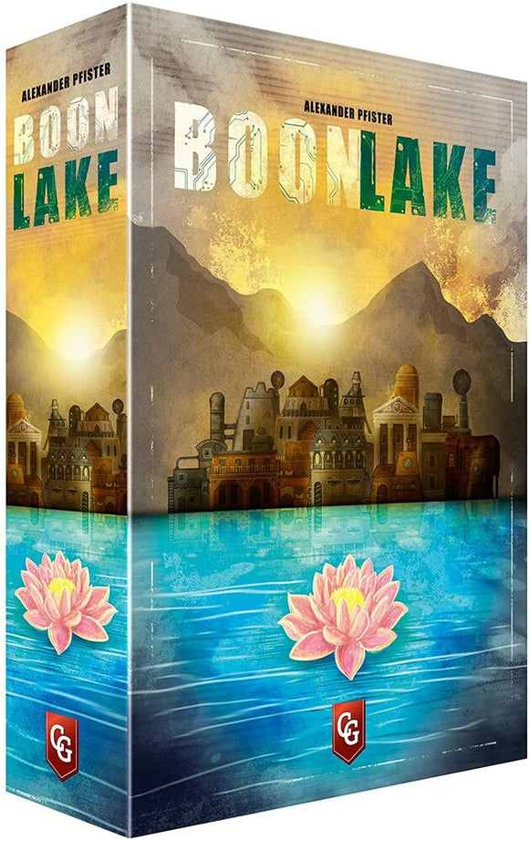 Boonlake board game box by Capstone Games featuring a serene lake scene with picturesque landscapes. The cover showcases a vibrant sunset with stylized buildings along the water's edge and beautiful pink lotus flowers in the foreground. The title 'BOONLAKE' is prominently displayed in bold letters.