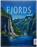 The game 'Fjords' designed by Franz-Benno Delonge, featuring a picturesque landscape of steep cliffs and a serene body of water, adorned with a lone sailboat. The cover art showcases lush greenery and vibrant blue skies, inviting players into a scenic adventure.
