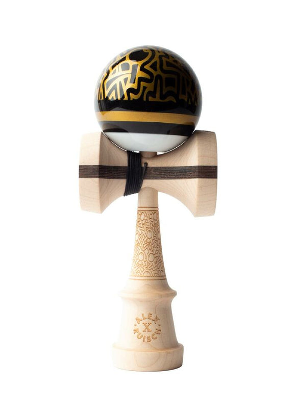 Alex Ruisch Legend Kendama by Sweets Kendamas featuring a striking black and gold design. The kendama has a wooden handle and a smooth ball that fits snugly on the spike, perfect for tricks and skill development.