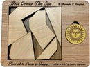 Here Comes the Sun mechanical puzzle by Creative Craft House, featuring six uniquely shaped wooden pieces that fit into a sun-patterned frame. The set includes a vintage sun emblem, inviting users to solve the puzzle and enhance spatial reasoning skills. Ideal for puzzle enthusiasts and collectors alike.