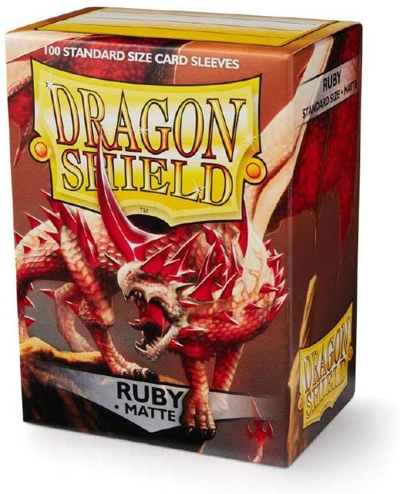 Dragon Shields Matte Ruby card sleeves box featuring a fierce red dragon design. Contains 100 standard size card sleeves, perfect for protecting trading cards.