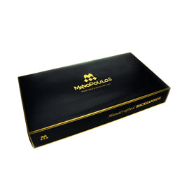A sleek black box featuring the Manopoulos logo, prominently displaying the text 'Handcrafted BACKGAMMON.' This elegant packaging hints at the premium quality of the 15 inch Walnut Replica Backgammon Set inside, suitable for classic game lovers.