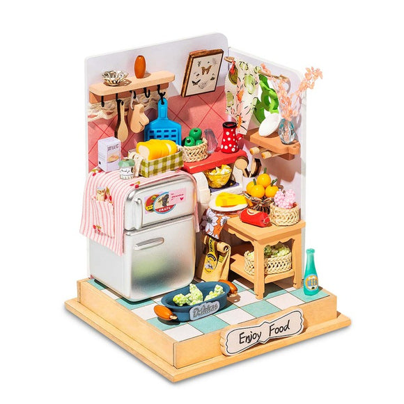 A beautifully crafted DIY model kit titled 'Taste Life Kitchen' by Robotime. This miniature kitchen scene features a shiny silver fridge, a variety of colorful fruits and vegetables on display, shelves adorned with kitchen tools, and a charming tiled floor. Perfect for those who enjoy intricate crafting and home decor.