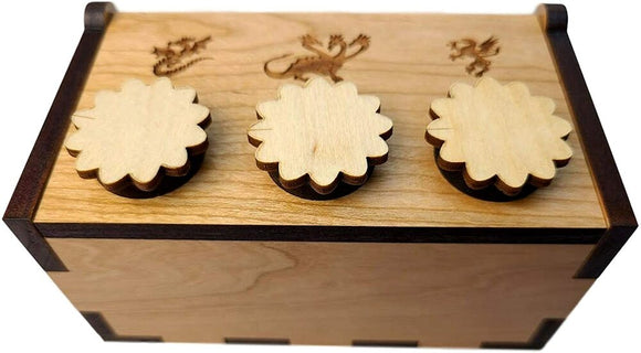 A wooden dragon puzzle box by Creative Craft House featuring intricate designs of dragons etched on the lid. The box has three flower-shaped buttons for unlocking mechanisms. It showcases a natural wood finish with dark edges, offering a tactile and engaging experience.