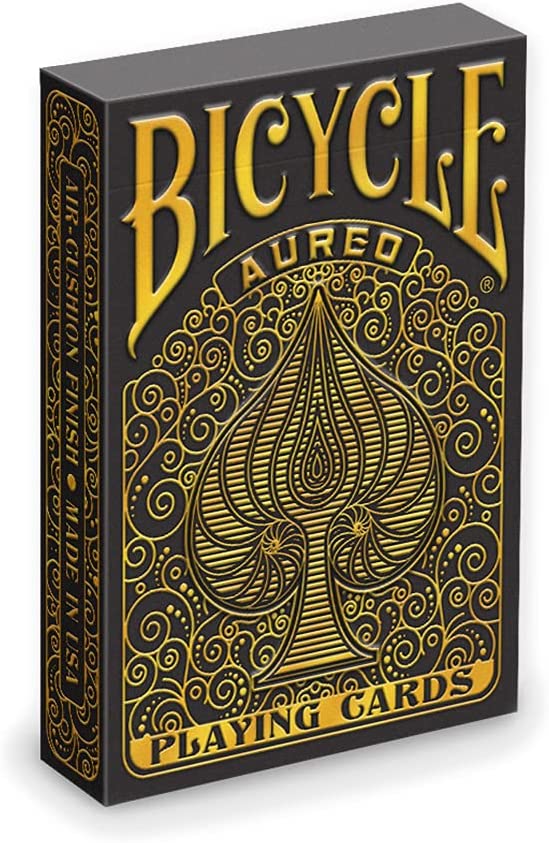 Bicycle Aureo Black Cards featuring elegant gold and black design with a detailed spade symbol, packaged in a classic rectangular card box. Ideal for card games and magic tricks.