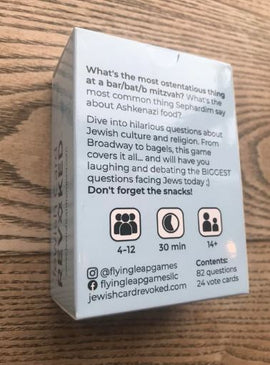 A game box for 'Jewish Card Revoked' by Flying Leap Games, featuring a humorous design. The back of the box includes questions related to Jewish culture, religion, and traditions, encouraging players to laugh and debate about common Jewish experiences. It highlights gameplay details like player count (4-12), game duration (30 minutes), and age recommendation (14+).