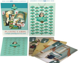 Janet Hill Playing Cards by New York Puzzle Company. The deck features unique paintings on every card, showcasing colorful illustrations of characters and scenes, with an artistic cover design highlighting the Janet Hill Studio logo.