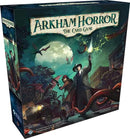 Arkham Horror: The Card Game box featuring a dark, atmospheric illustration. The artwork shows two characters in vintage attire, one holding a flashlight and the other a gun, facing an unseen threat amid a spooky landscape with flying creatures and mist. The game box is designed for 1 to 4 players and incorporates elements of horror and mystery.