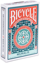 A Bicycle Muralis Card Deck from US Playing Card Co. The deck features an intricate and colorful design with a turquoise and coral pattern. It has an air-cushion finish for easy handling and is proudly made in the USA. The front of the box reads 'Bicycle Muralis Playing Cards' in bold lettering, emphasizing its quality and craftsmanship.