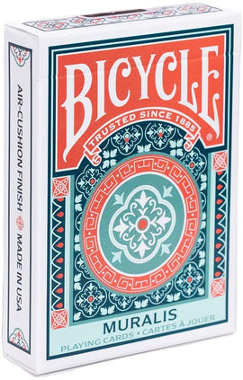 A Bicycle Muralis Card Deck from US Playing Card Co. The deck features an intricate and colorful design with a turquoise and coral pattern. It has an air-cushion finish for easy handling and is proudly made in the USA. The front of the box reads 'Bicycle Muralis Playing Cards' in bold lettering, emphasizing its quality and craftsmanship.