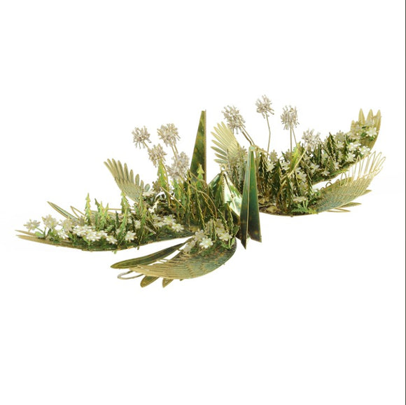 Dandelion Crane DIY model kit by Piececool, featuring intricate metal parts designed to assemble into a delicate sculpture resembling a crane among flowers and grass. The model showcases beautiful detailing and requires precision for assembly.