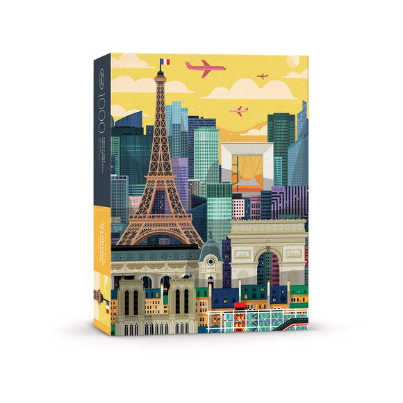 Jigsaw puzzle box featuring a colorful illustration of Paris with iconic landmarks like the Eiffel Tower and the Arc de Triomphe against a vibrant city skyline and sunset. The puzzle contains 1000 pieces and comes in a stylish, sturdy box.