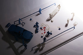 On Site Examination Model by TERADA MOKEI, featuring a detailed crime scene diorama with miniature figures, a police car, and evidence markers. Ideal for educational and creative purposes, this DIY kit encourages imaginative play and exploration of forensic themes.