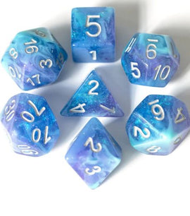 A beautiful Cerulean Night RPG Dice Set featuring seven polyhedral dice in shades of blue and purple with sparkles. The numbers are engraved and highlighted in white for easy reading. The set includes dice in various shapes for tabletop gaming, perfect for enhancing the role-playing experience.