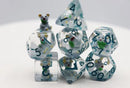 A colorful set of Koala RPG dice featuring six different polyhedral shapes. Each die is clear with vibrant blue, green, and yellow accents, and includes a tiny koala figure on one die. The numbers are clearly visible in bold print, making it easy to read and use during gameplay.