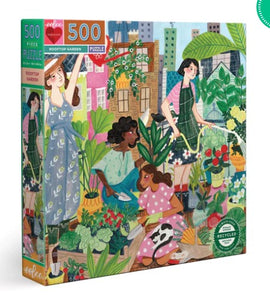 Rooftop Garden jigsaw puzzle by Eeboo featuring an illustrated scene with three women tending to a vibrant rooftop garden filled with flowers, plants, and greenery. The puzzle box showcases a colorful design, highlighting the 500 pieces and eco-friendly materials used in its creation.