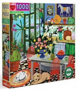Eeboo Green Kitchen jigsaw puzzle featuring a vibrant kitchen scene with colorful chairs, a table adorned with flowers, and a playful dog on the floor. The background showcases a sunny garden view through large windows, filled with plants and bright colors, with various kitchen items displayed on shelves, creating a lively and inviting atmosphere. This 1000-piece puzzle is crafted with recycled materials.