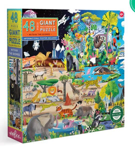 Colorful box of the 'Within the Biome' 48-piece jigsaw puzzle by Eeboo, featuring vibrant illustrations of various animals in diverse ecosystems. The design showcases wildlife like elephants, gorillas, and tropical plants, with a label indicating it includes an informational poster. The packaging emphasizes its giant pieces suitable for children aged 4 and up, and highlights that it is made from recycled materials.