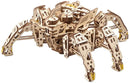 The Ugears 3D Hexapod Explorer is a detailed DIY mechanical model kit, designed to resemble a robotic spider. It features intricately cut wooden parts, showcasing a complex structure with a gear mechanism for movement, and legs designed for stability and mobility. Ideal for engineering enthusiasts and model builders, this kit offers a hands-on experience and a visually striking finished product.